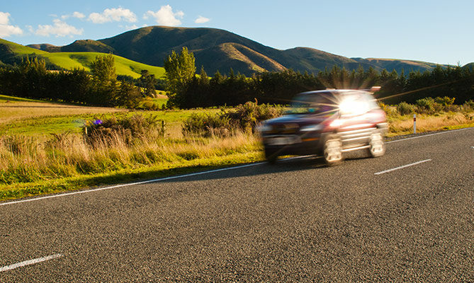 Car driving on open road